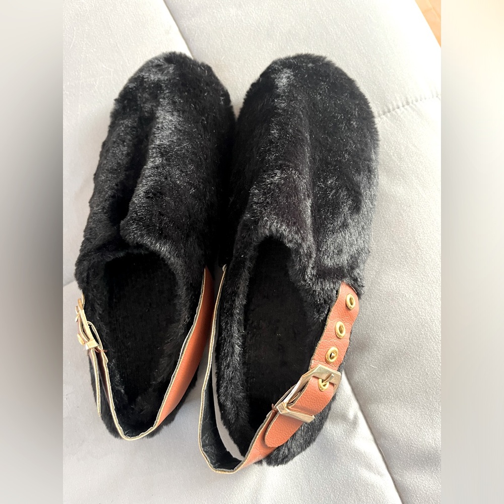 Faux fur sandal type mule. Very unique shoes